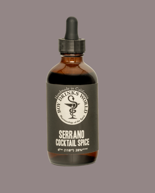 Bottle of Serrano Cocktail Spice with a dropper on a gray background