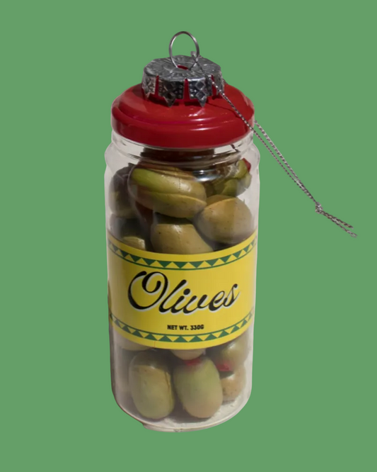 Decorative ornament shaped like a jar of olives on a green background
