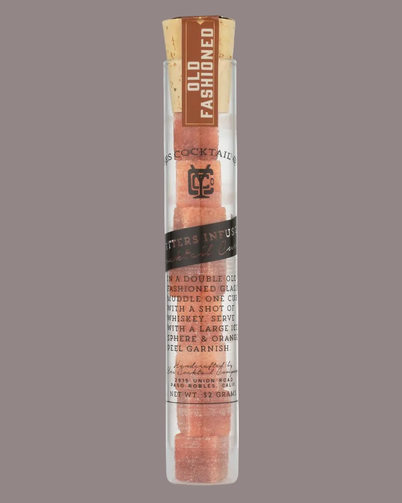 Corked bottle with decorative label on a gray background