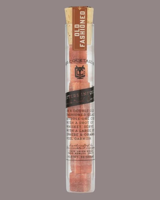 Corked bottle with decorative label on a gray background
