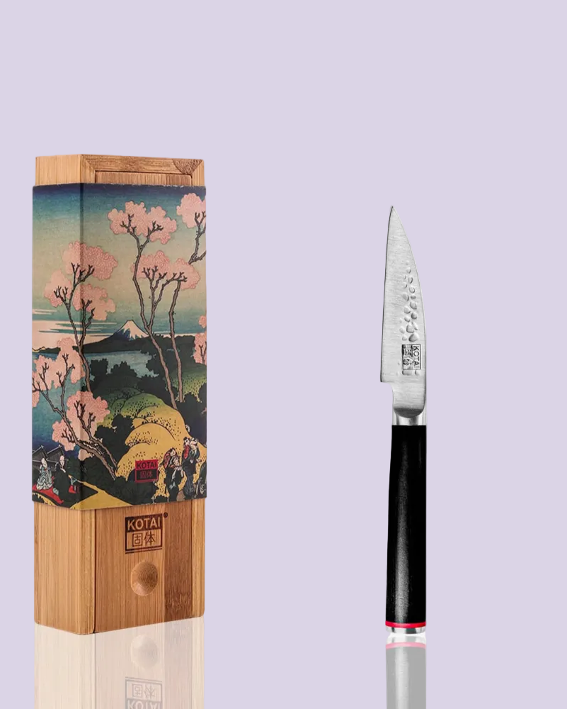 Japanese knife set with cherry blossom design packaging on a light purple background