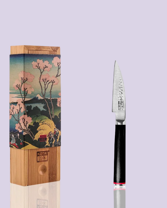 Japanese knife set with cherry blossom design packaging on a light purple background