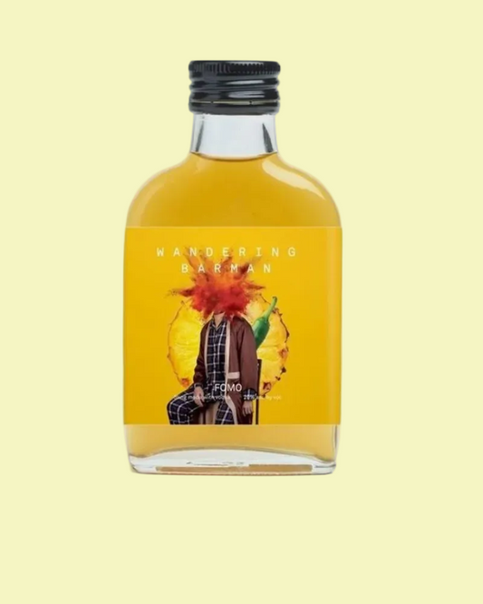 Bottle of 'Handering' gin with a colorful label on a light yellow background