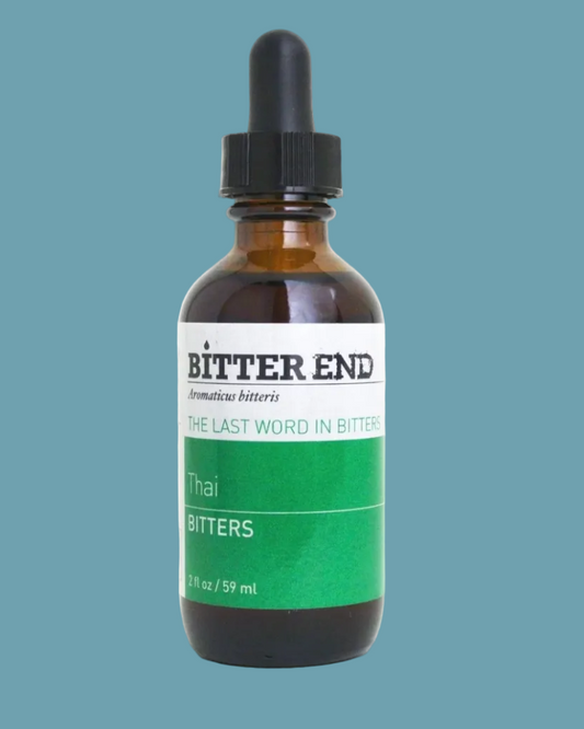 Bitter End Thai Bitters bottle with dropper on a teal background