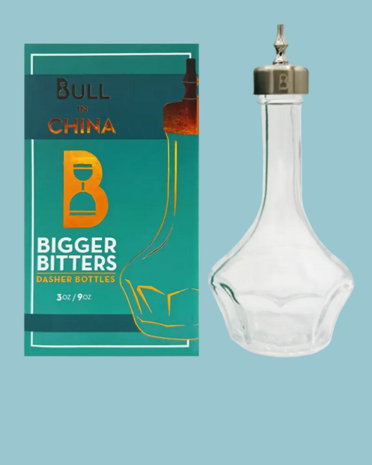 Bull in China Bigger Bitters packaging and glass bottle on a light blue background