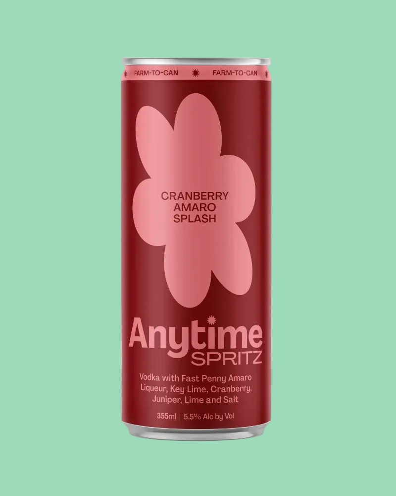 Red can of Anytime Spritz Cranberry Amaro Splash on a white background