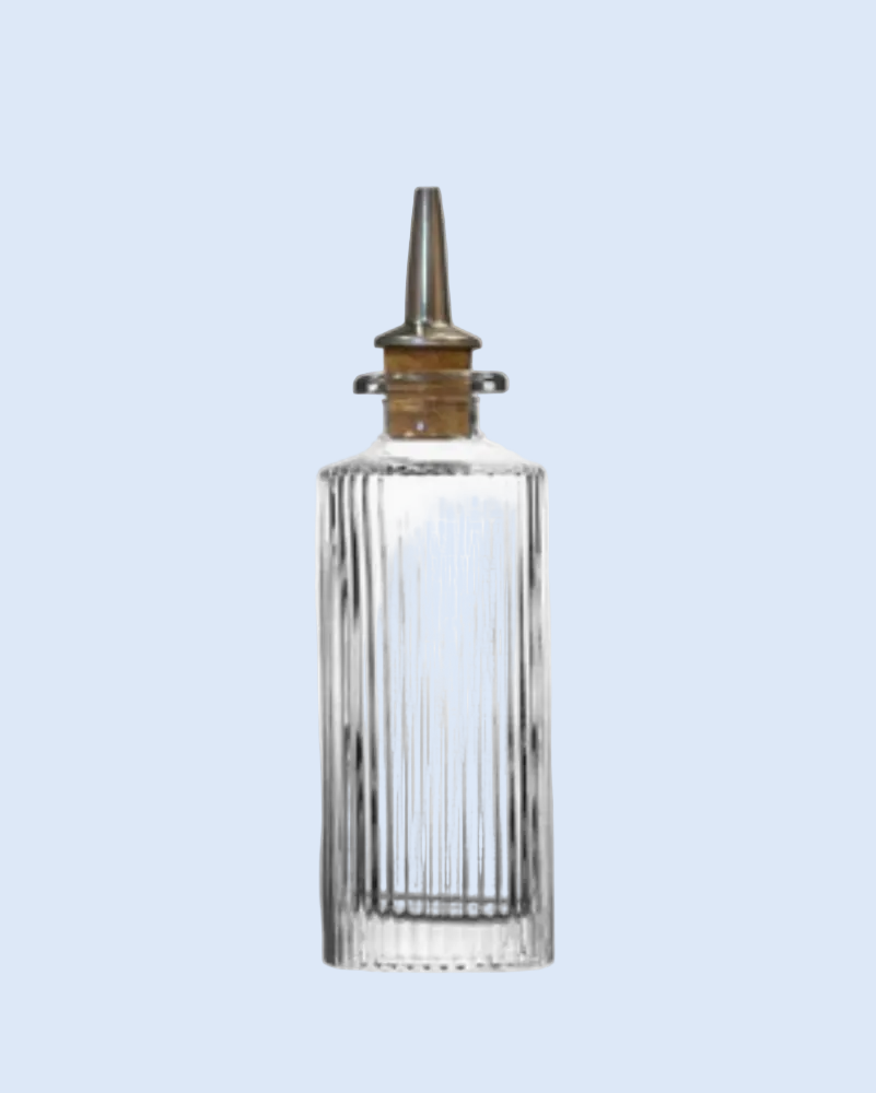 Clear glass bottle with a metallic cap on a light blue background