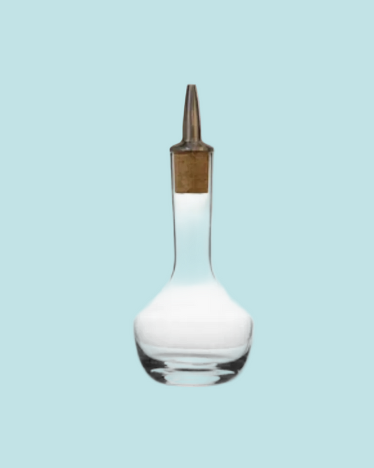 White dropper bottle with a wooden cap on a light blue background