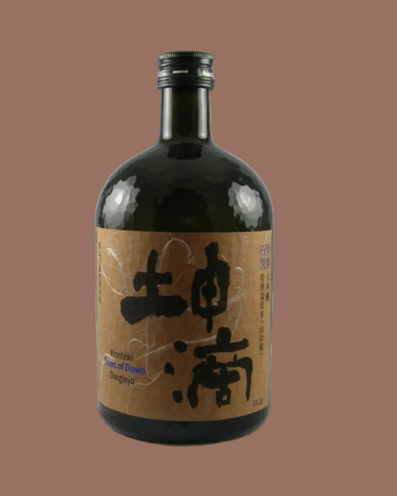 Bottle of Japanese sake with a brown label on a white background