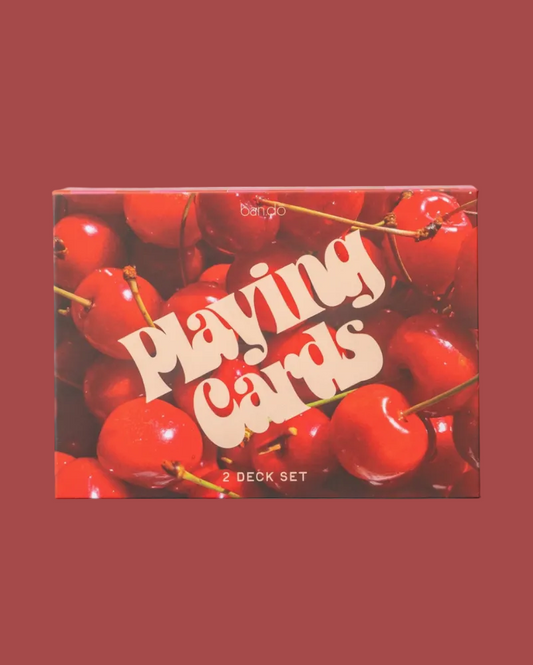 Playing cards box with cherry design on a white background