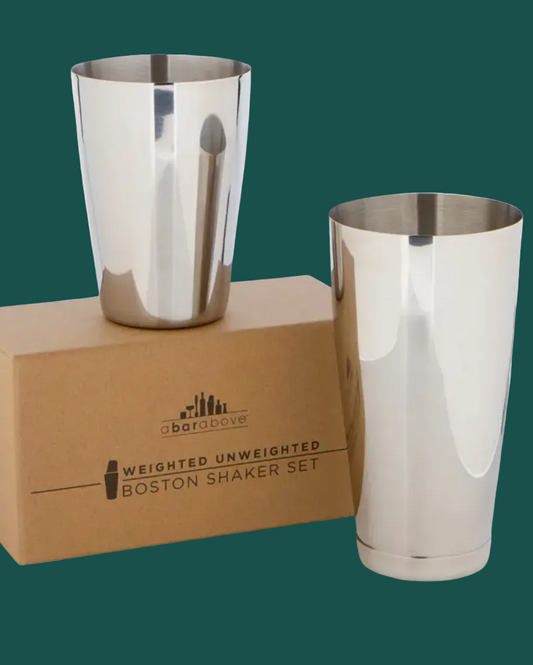 Two silver Boston shakers in front of a cardboard box with 'abarabove' branding.
