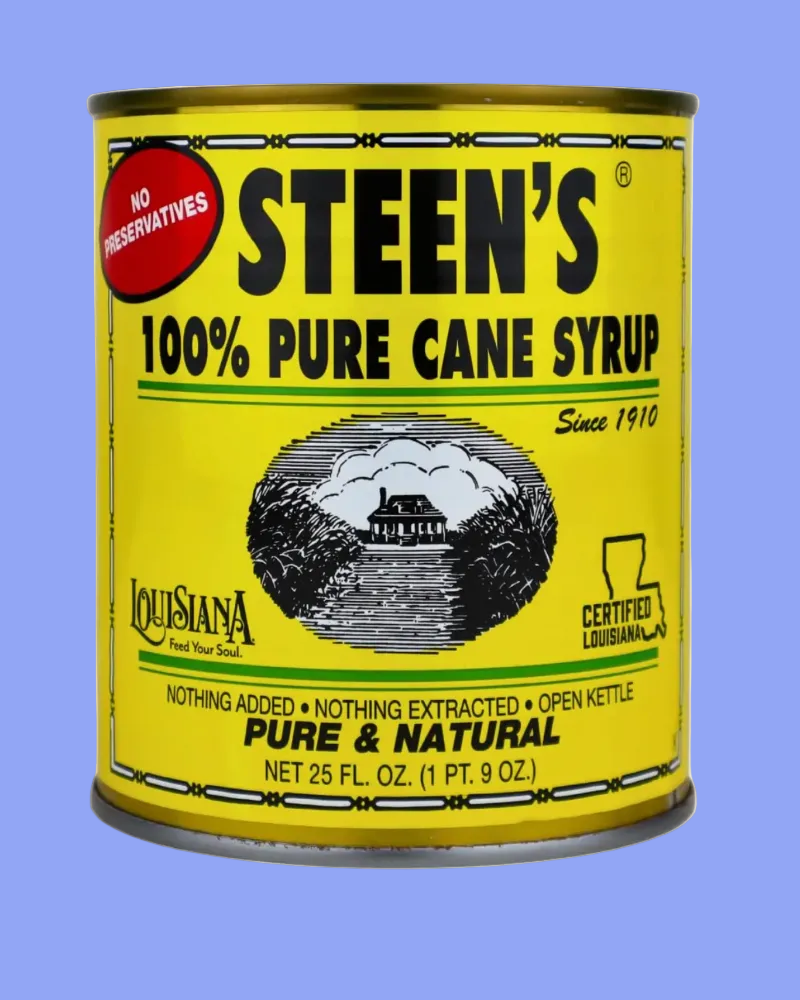 Steen's 100% Pure Cane Syrup can on a blue background