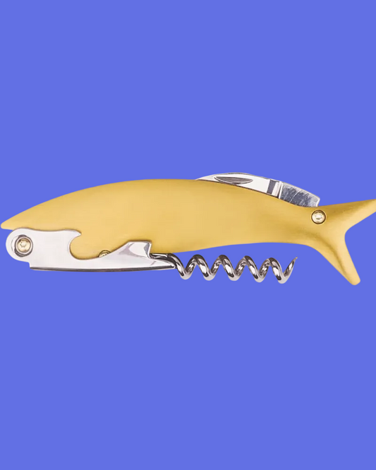Gold and silver corkscrew shaped like a fish on a blue background