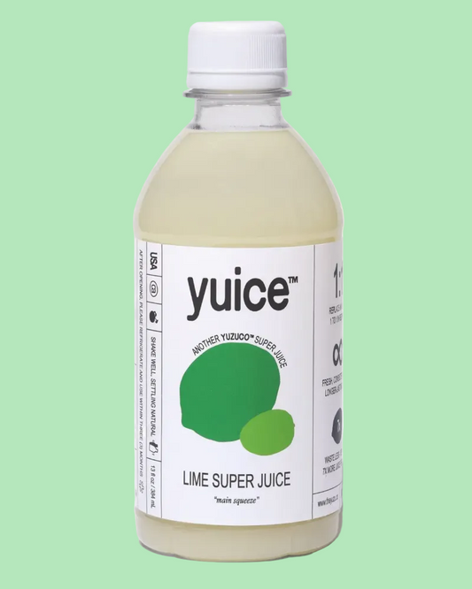 Bottle of yuice lime super juice on a white background
