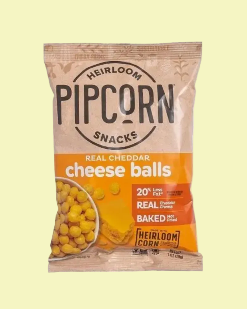 Packaging of Pipcorn Snacks Real Cheddar Cheese Balls on a white background
