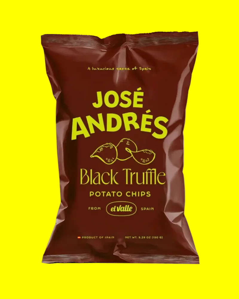 Bag of José Andrés Black Truffle Potato Chips on a yellow background