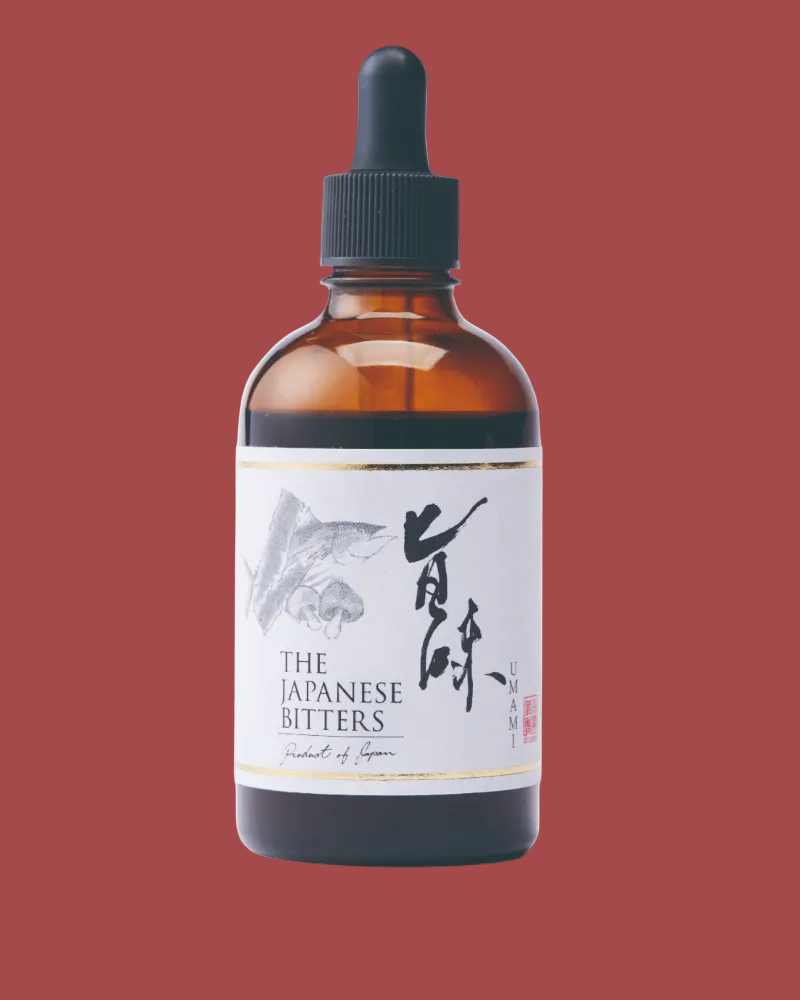 Bottle of 'The Japanese Bitters' with a dropper labeled 'UMAMI' on a white background