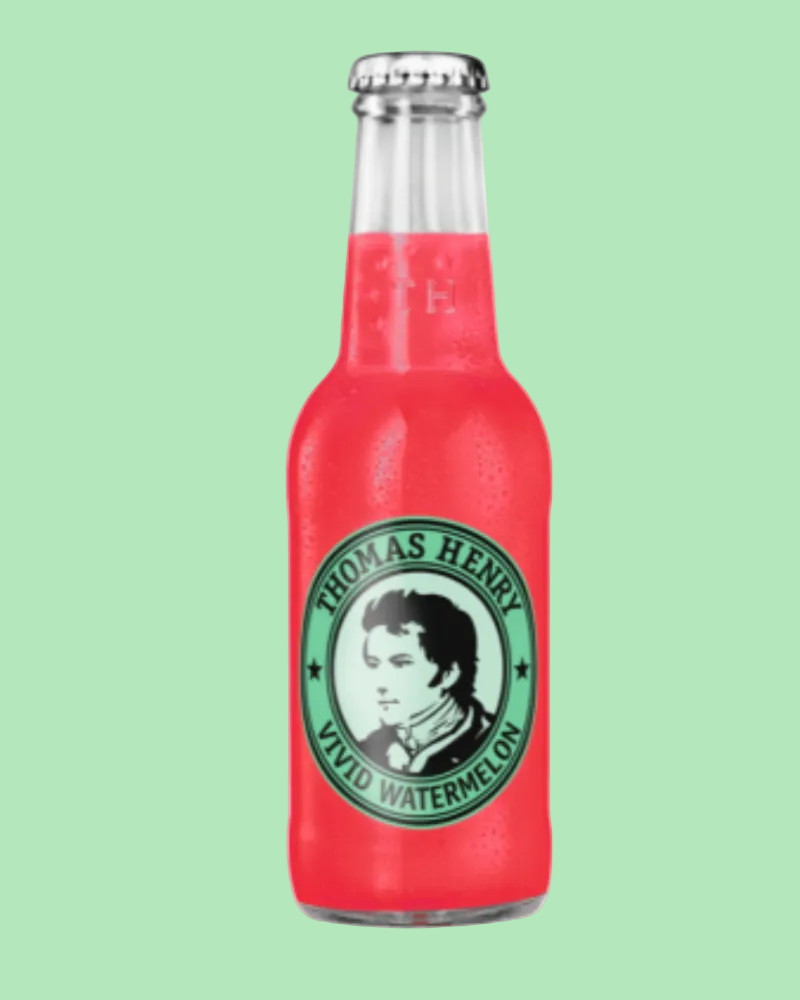 Red bottle of Thomas Henry Vivid Watermelon on a white background