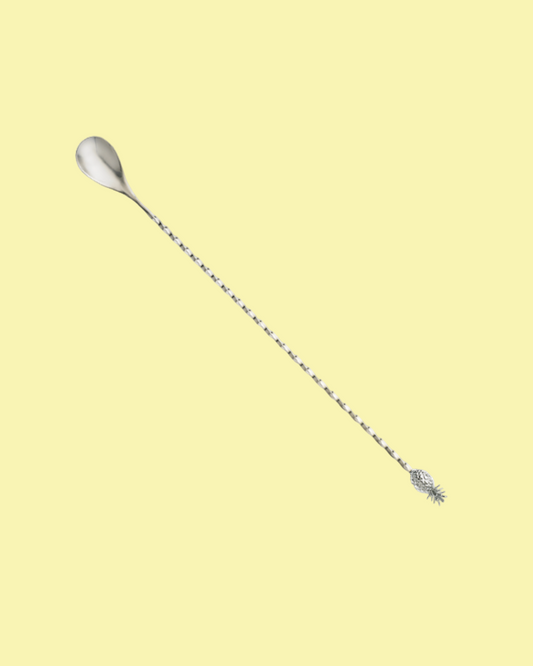Silver bar spoon on a white background