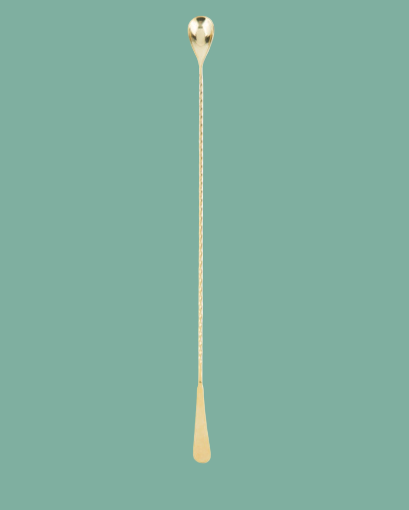 Gold spoon on a white background