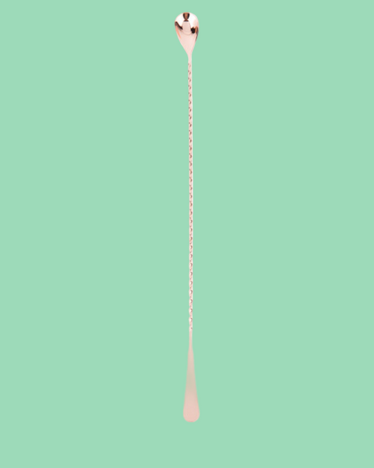 Copper spoon on a white background