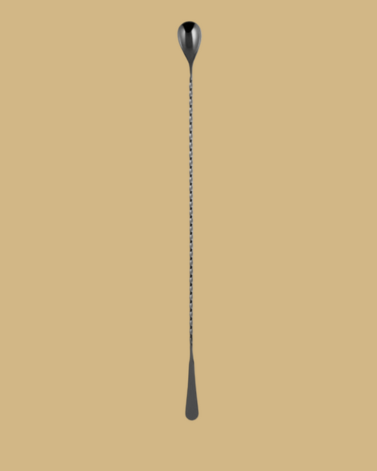 Long metal spoon on a white background