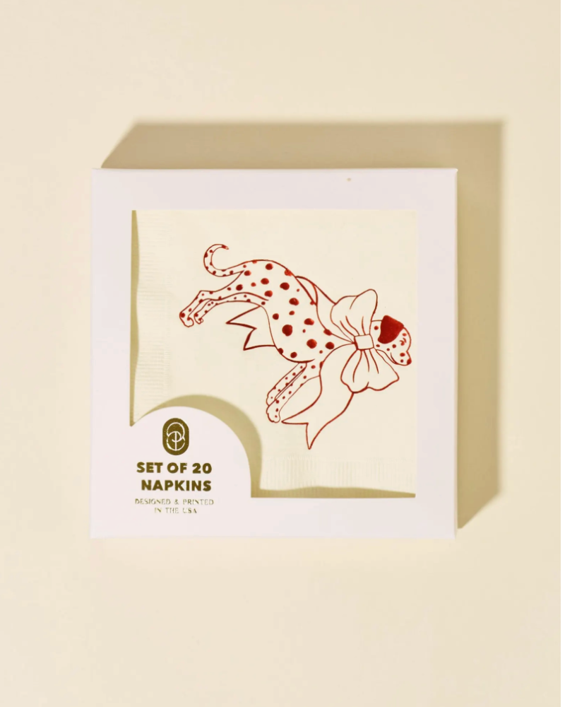 Packaging of napkins with a leopard design on a beige background