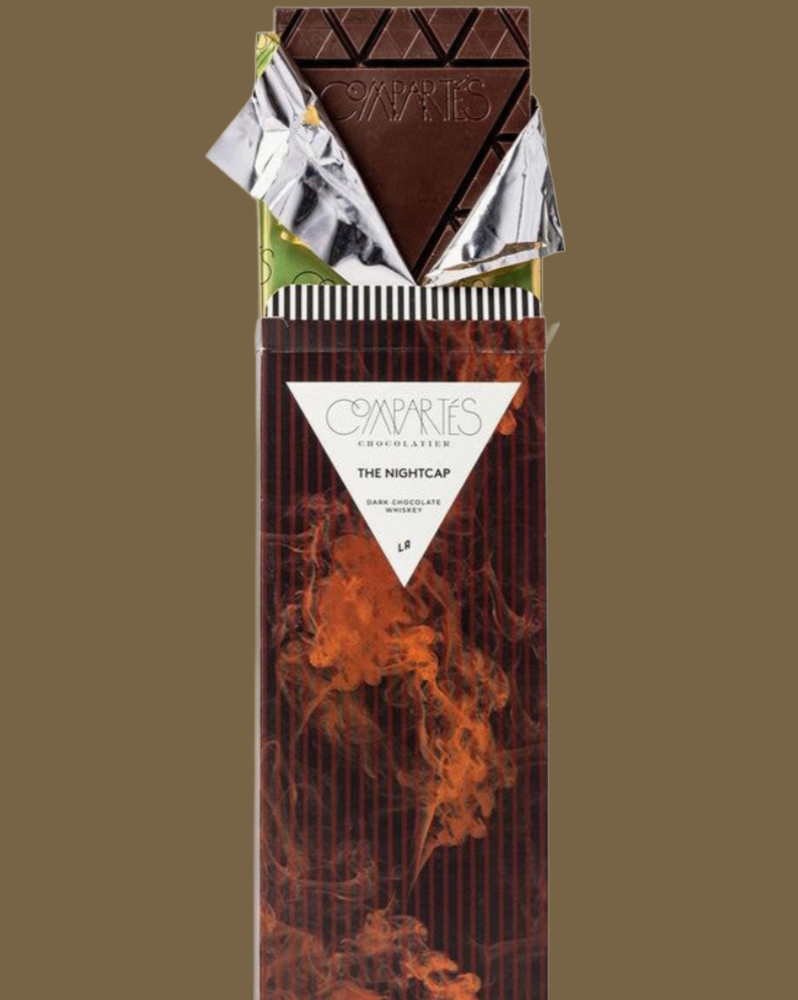 Chocolate bar with packaging featuring Campari's The Nightcap design on a brown background