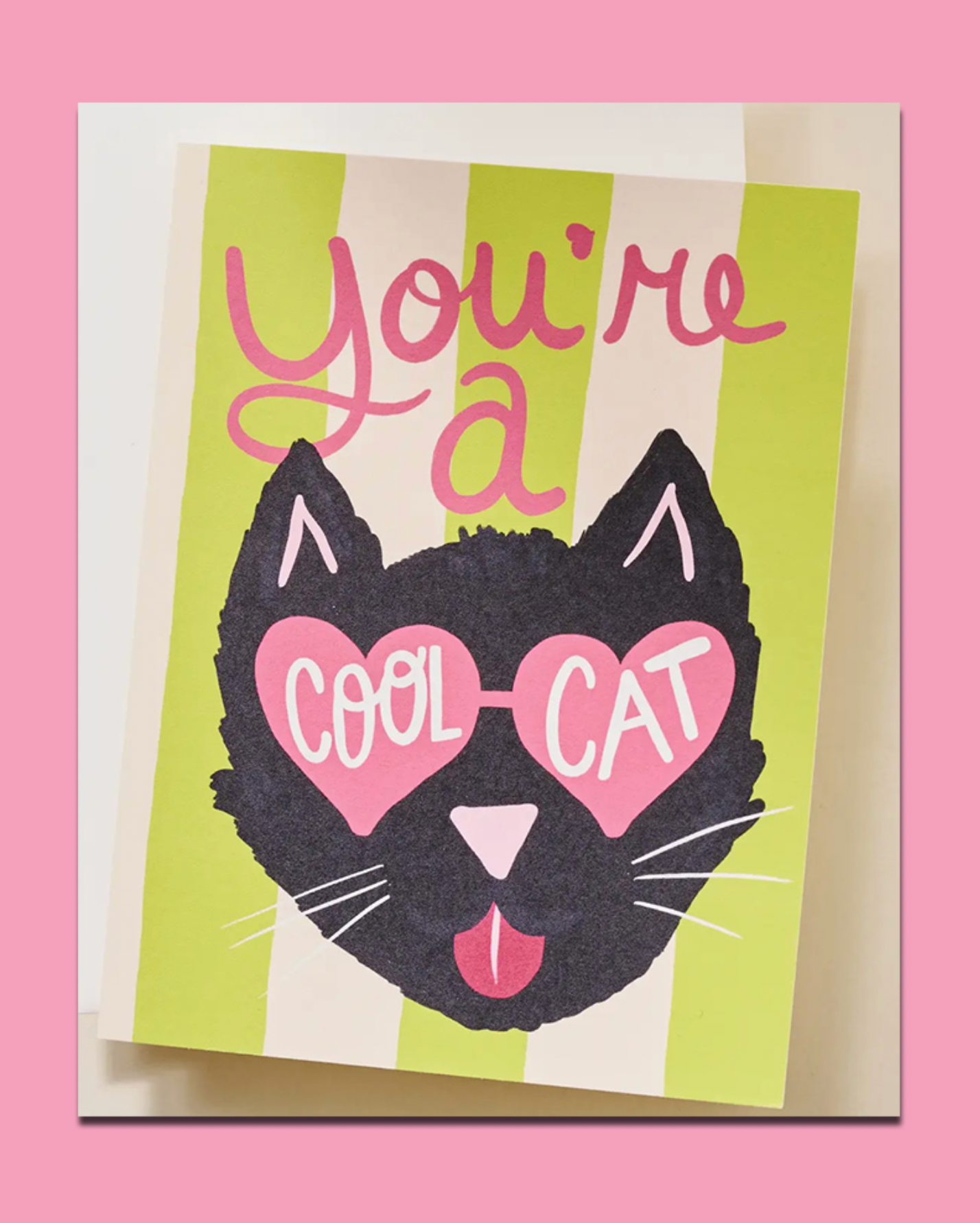 Card with a black cat illustration and text 'You're a cool cat' on a striped background
