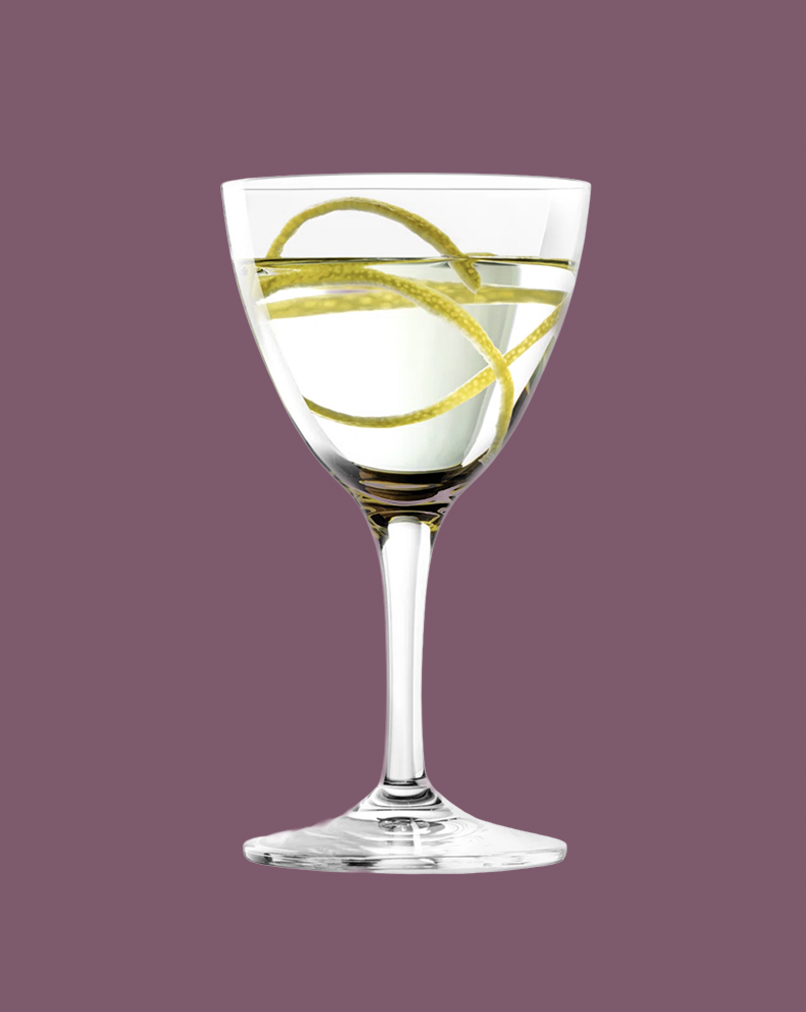 Cocktail glass with a lemon twist on a purple background