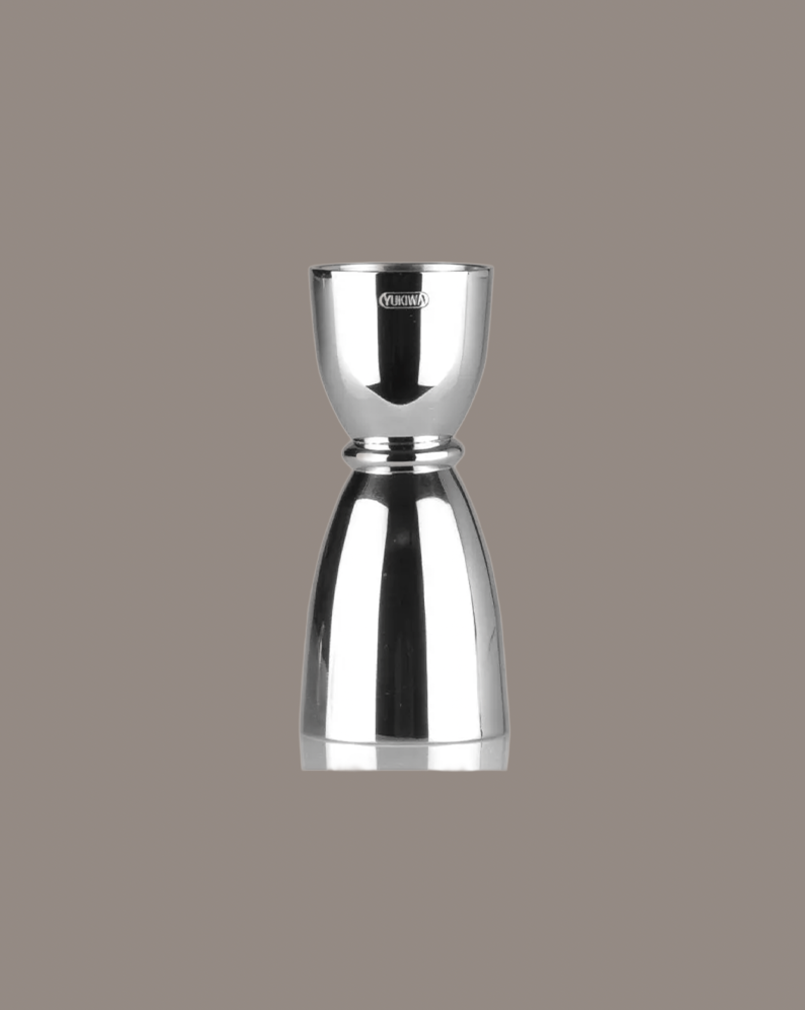 Silver jigger on a gray background