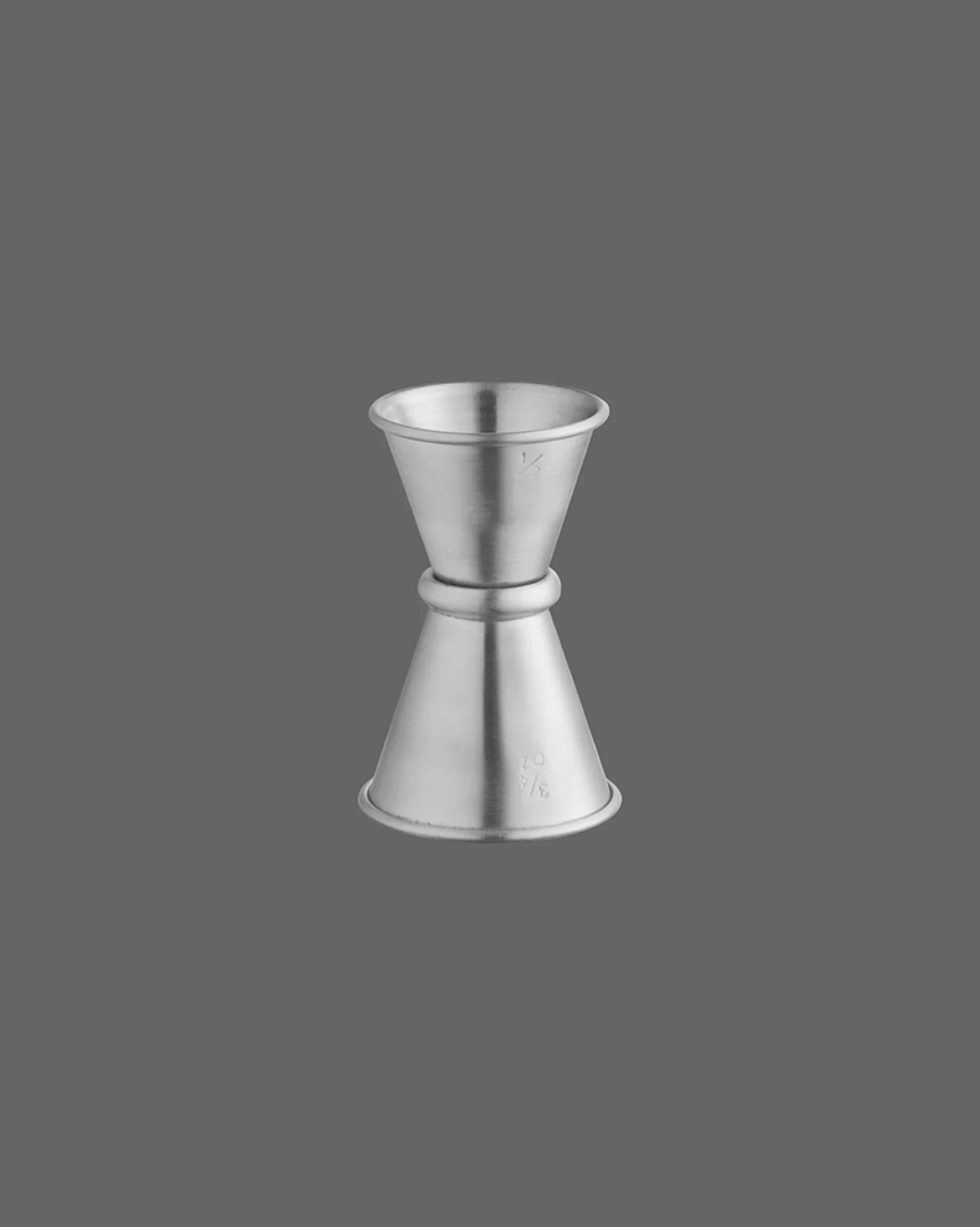 Metallic jigger on a gray background