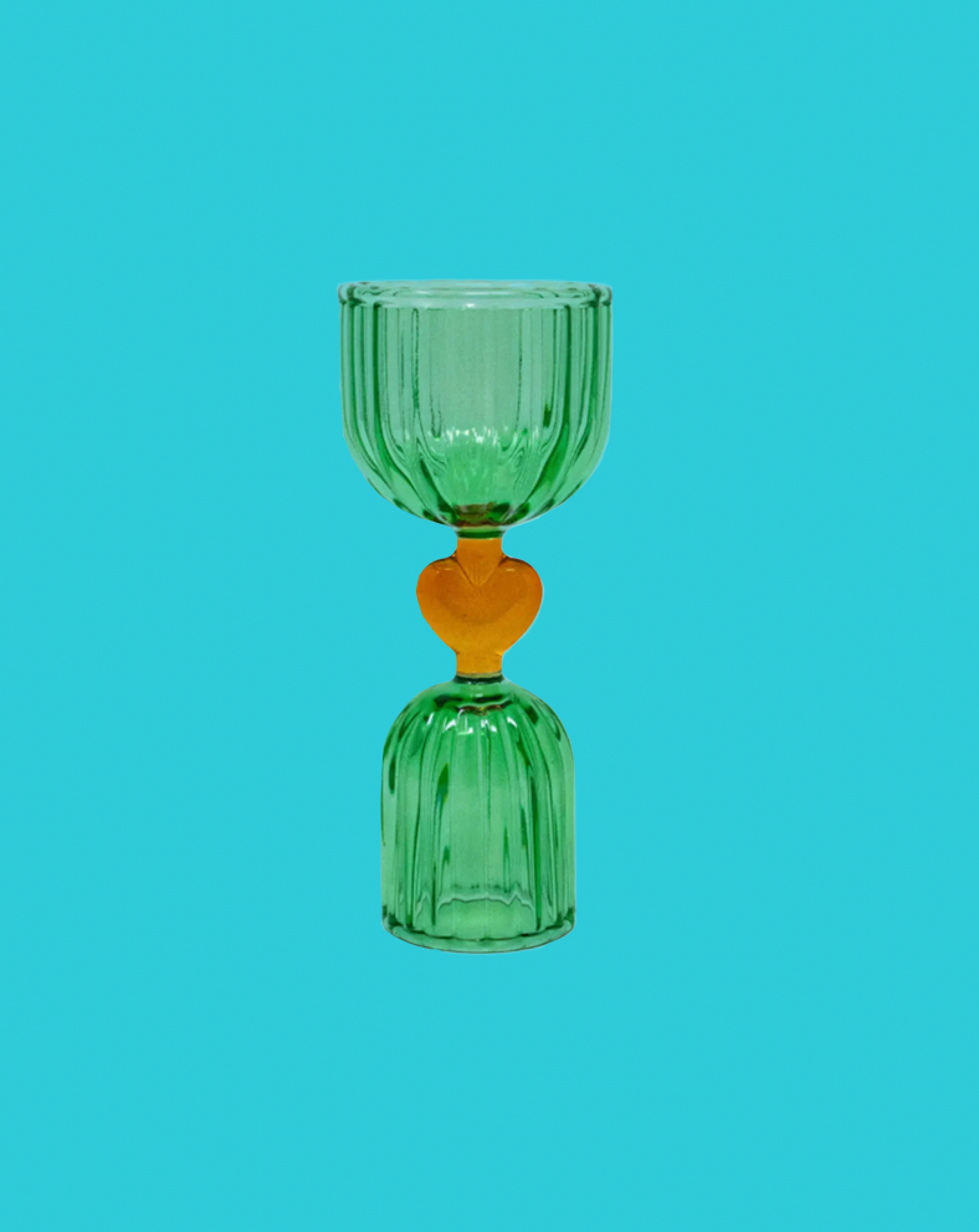 Green glass vase with a heart-shaped accent on a blue background