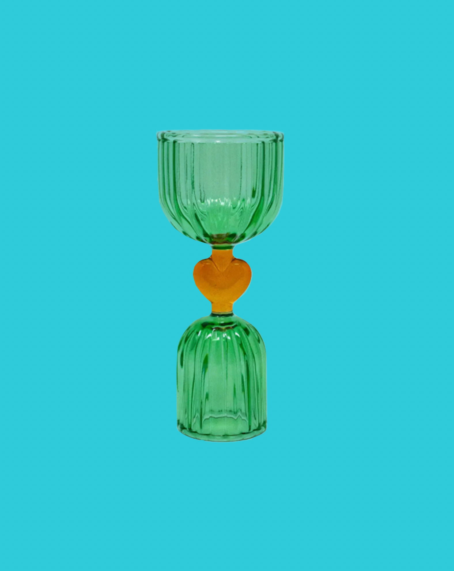 Green glass vase with a heart-shaped accent on a blue background