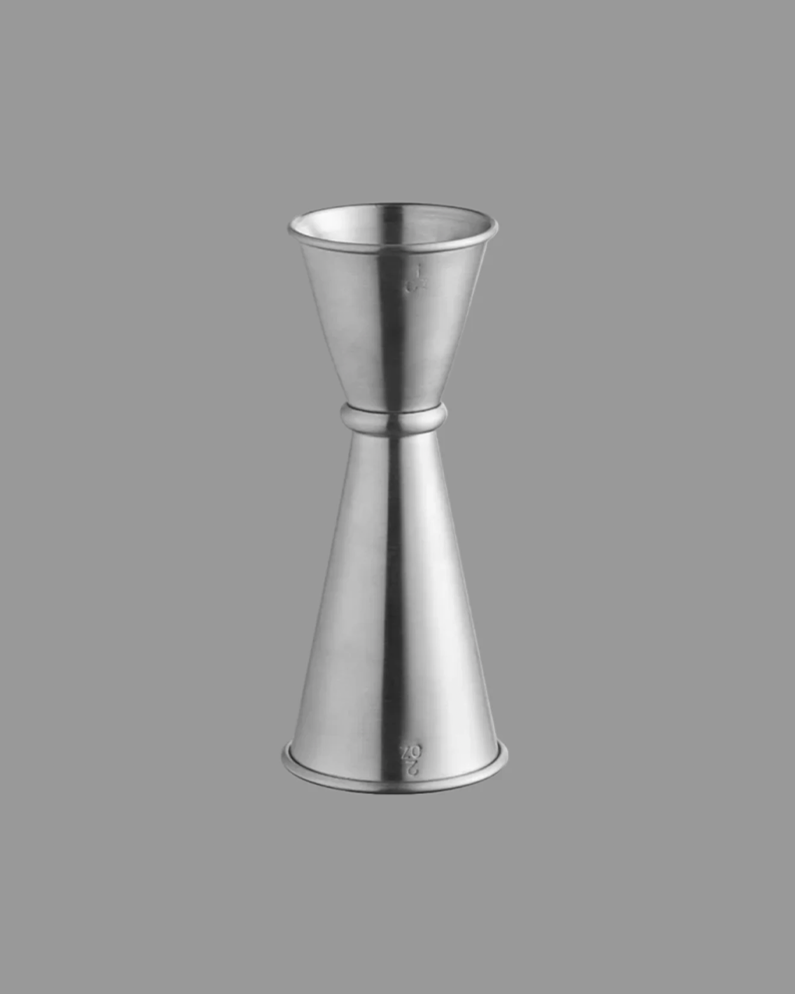 Metallic cocktail shaker on a gray background
