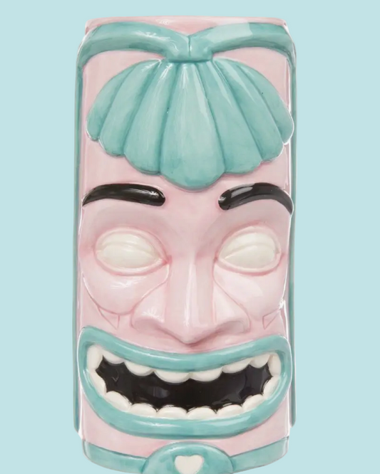 Decorative phone case with a cartoonish face design on a light blue background