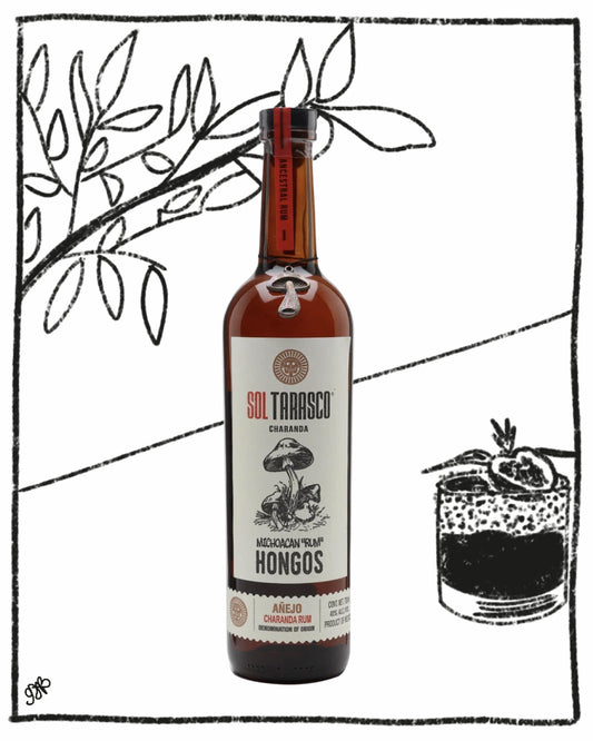 Bottle of Sol Tarasco Chilacane with a label featuring mushrooms and a black and white illustration of a cocktail.